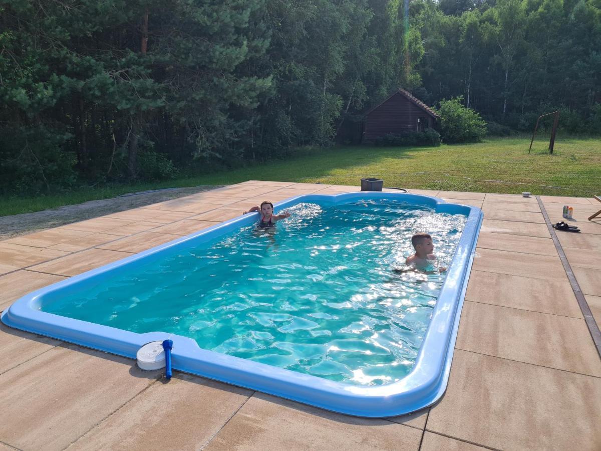 Dworek Ogrodniki: Rustic Retreat with Pool, Sauna, and Lakeside Charm Tuczna Exterior photo
