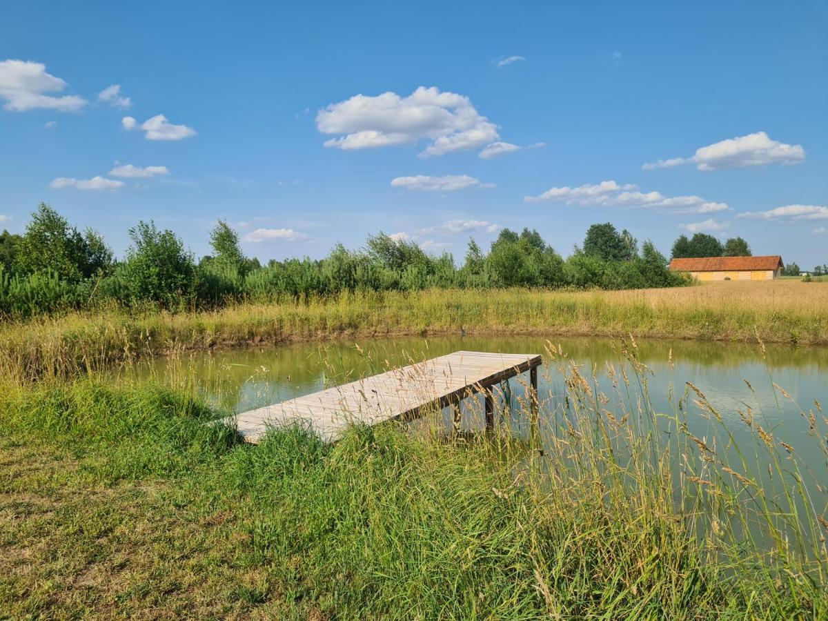 Dworek Ogrodniki: Rustic Retreat with Pool, Sauna, and Lakeside Charm Tuczna Exterior photo