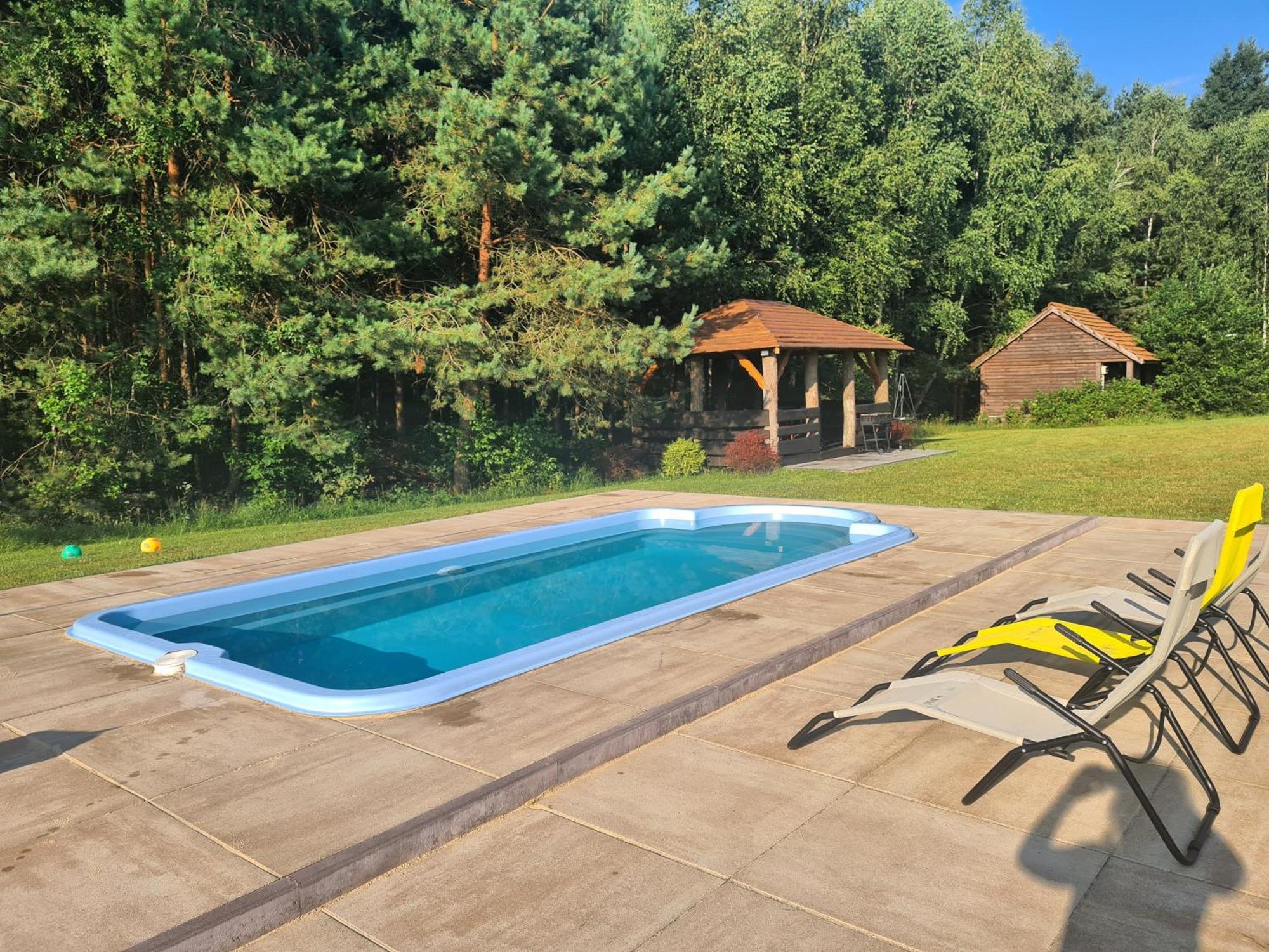 Dworek Ogrodniki: Rustic Retreat with Pool, Sauna, and Lakeside Charm Tuczna Exterior photo